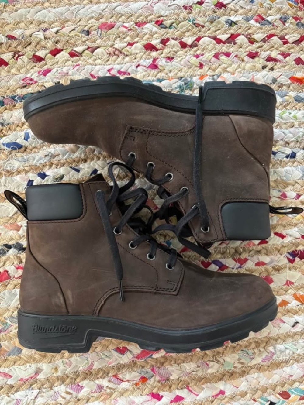 Brown leather Blundstone lace up boots.   Size 8.